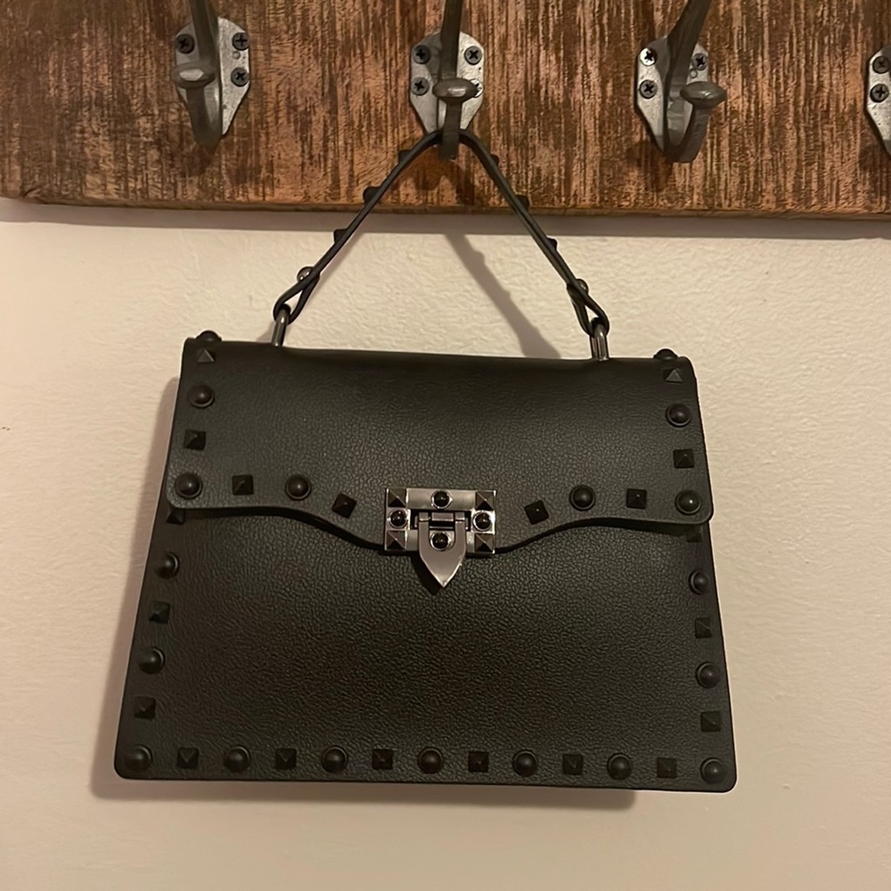 Black leather speedy with black hardware and studs.